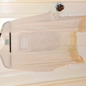 Beige sweater throw over